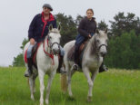 Riding guide with a member